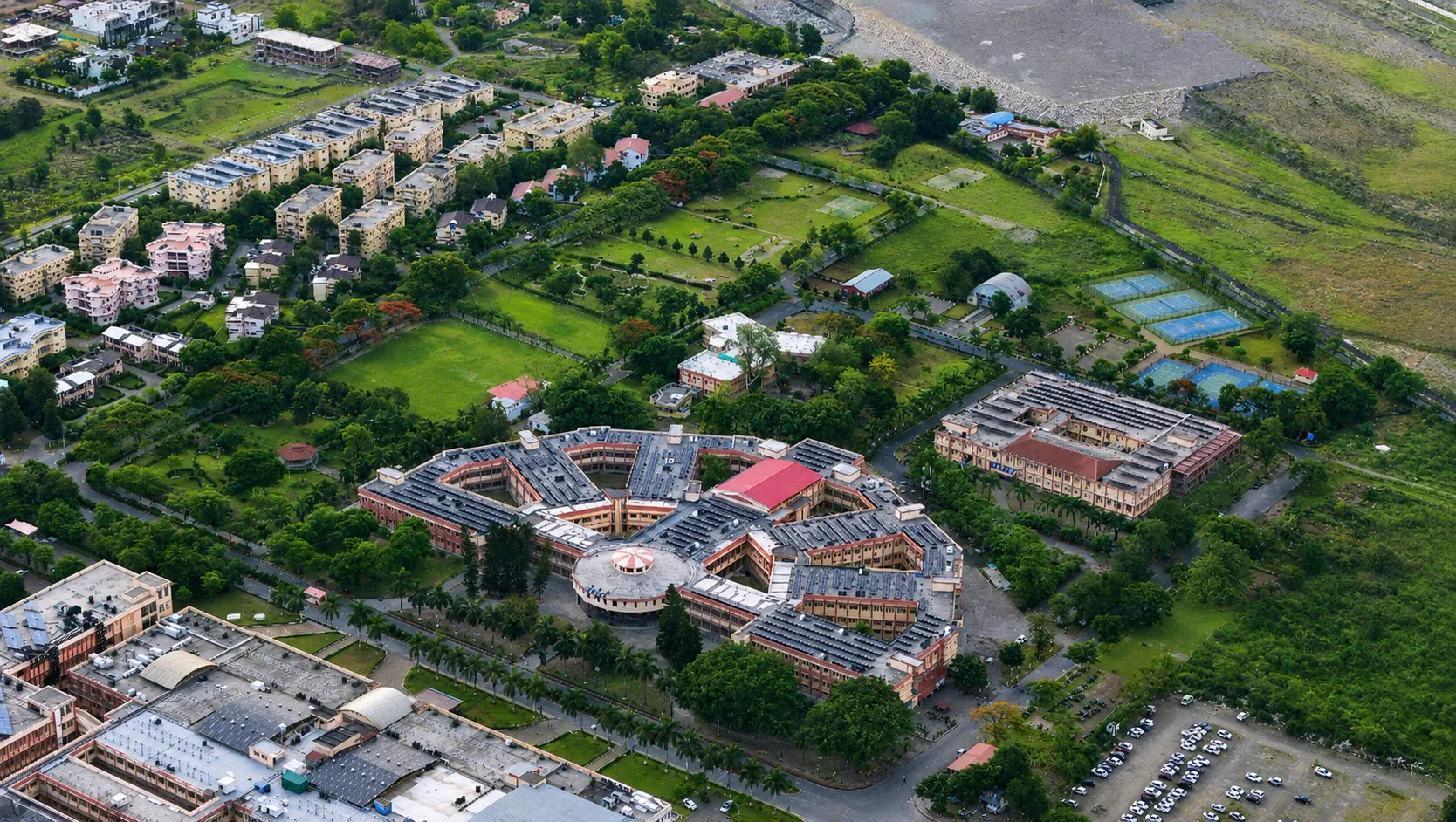 Swami Rama Himalayan University campus amid green hills